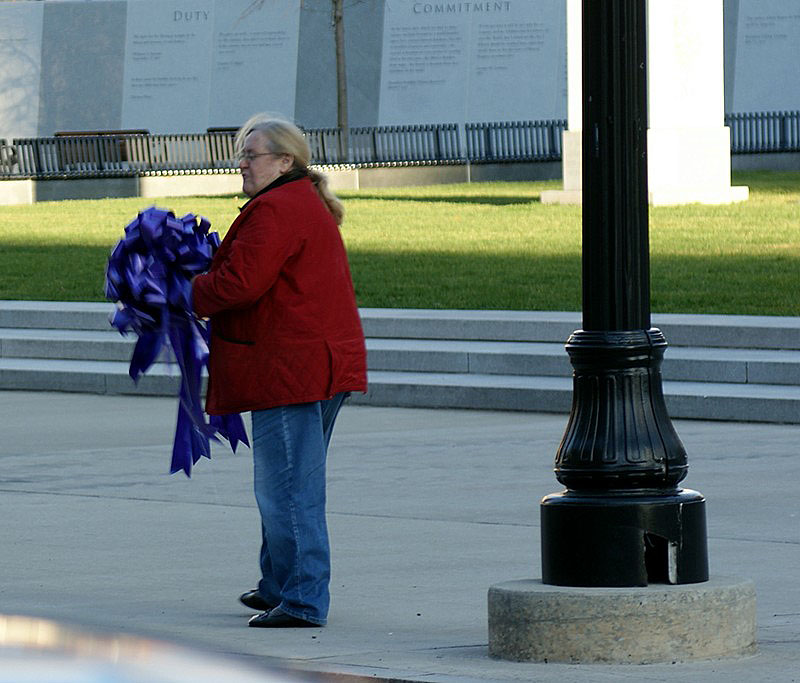 This woman hurried as she removed a ribbon from a lamppost so she could get out of Vi's way who was taking pictures. We get the impression that tourists are rare in Scranton.