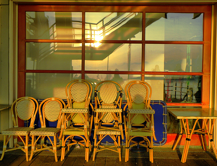 The weather was mild -- it reached the 50s -- but still it was winter and so outdoor furniture remain stacked. Vi took this photo.