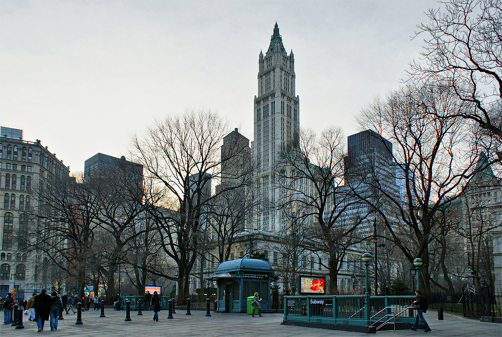 Brooklyn Bridge Subway Station at City Hall Park. New York City Hall is the small building right behind the station.