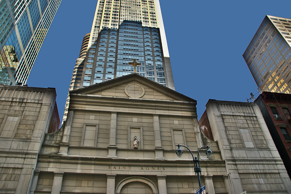Saint Agnes Church.Saint Agnes Church on East 43th Street is in a block surrounded by tall buildings.